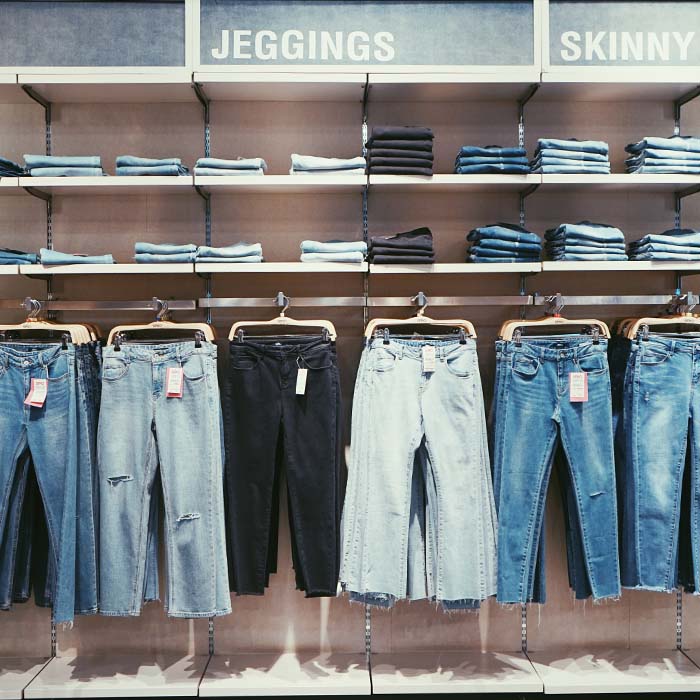 Display of jeans hanging up