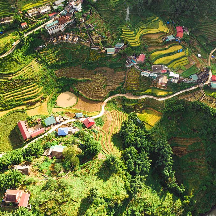 an aerial view of a community in Laos